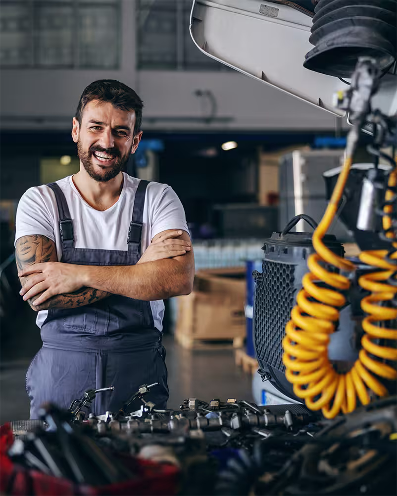 Assurance W Garage, illustration d’un mécanicien dans un garage